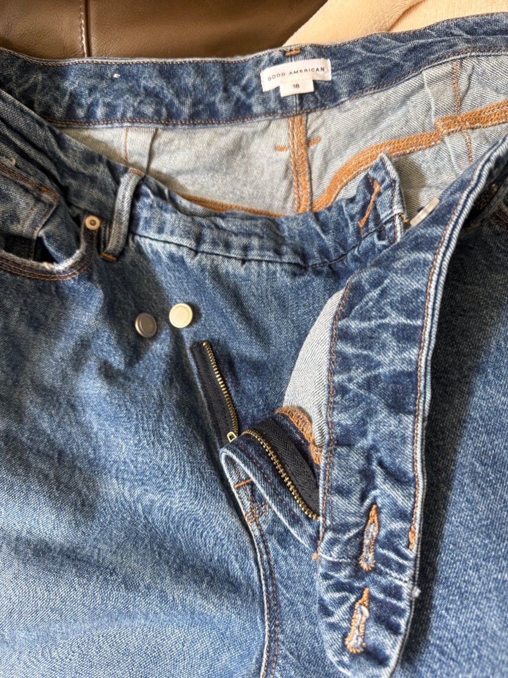 Good American Wide leg jeans with asymmetrical button